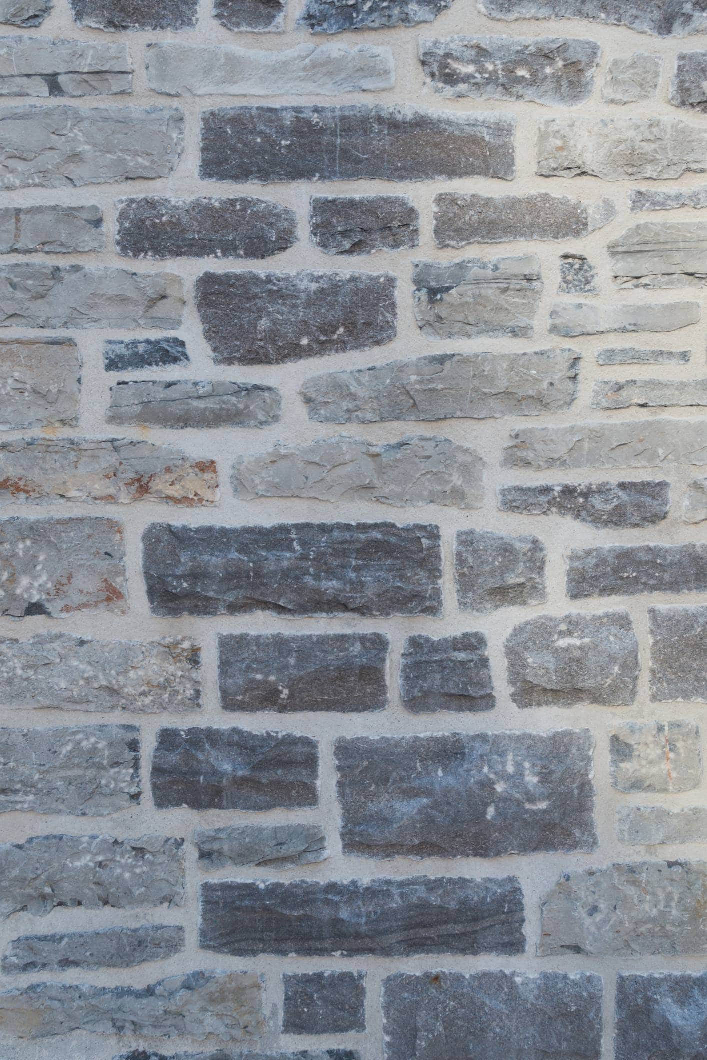 décaper et sabler les murs en pierre, façades en briques